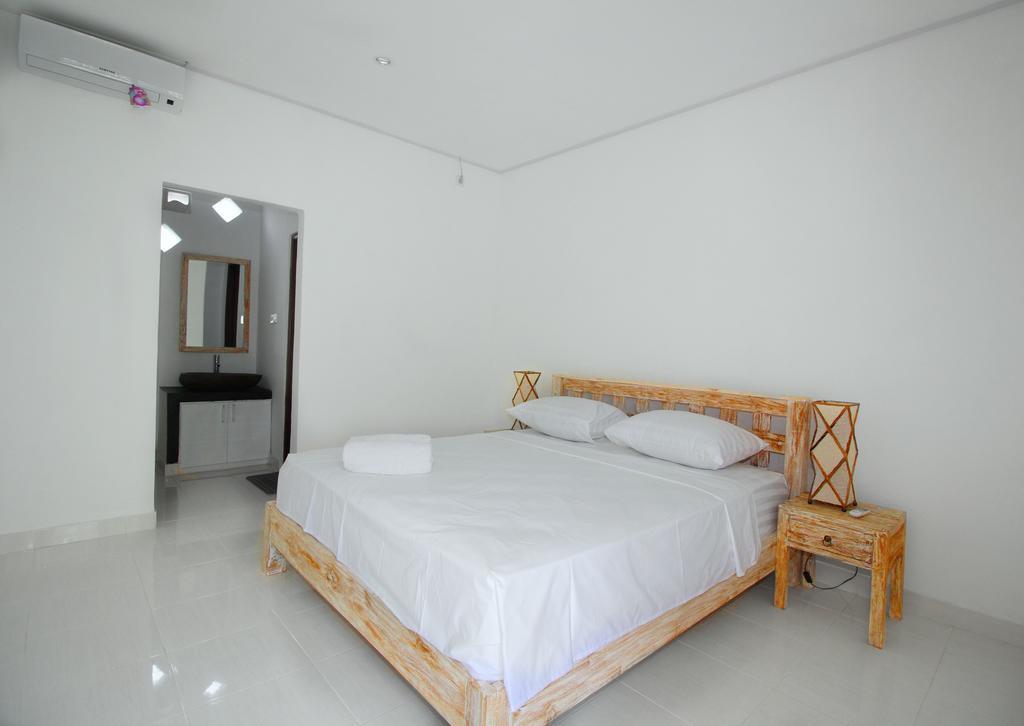 Andy Guesthouse Canggu Extérieur photo