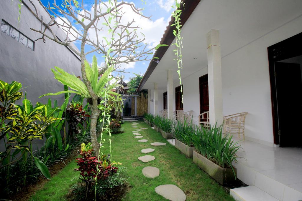 Andy Guesthouse Canggu Extérieur photo