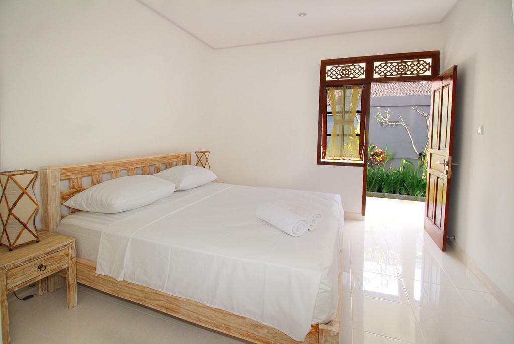 Andy Guesthouse Canggu Extérieur photo