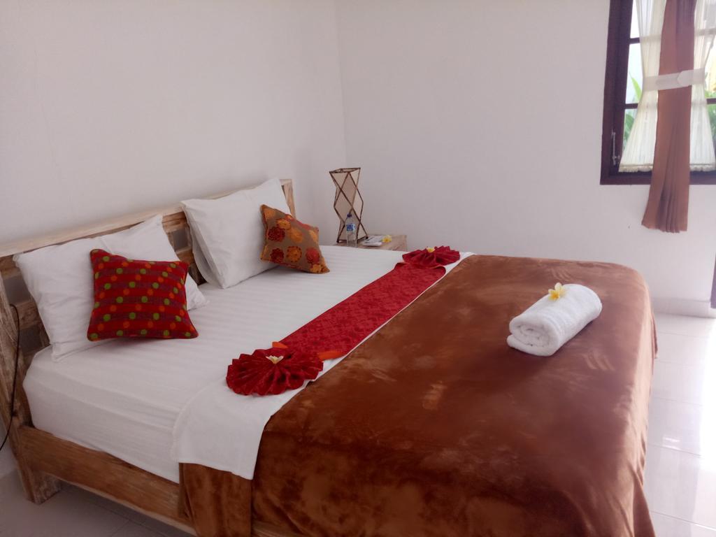 Andy Guesthouse Canggu Extérieur photo