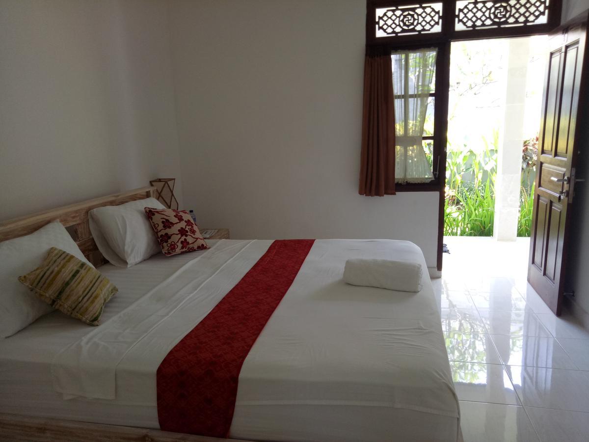 Andy Guesthouse Canggu Extérieur photo