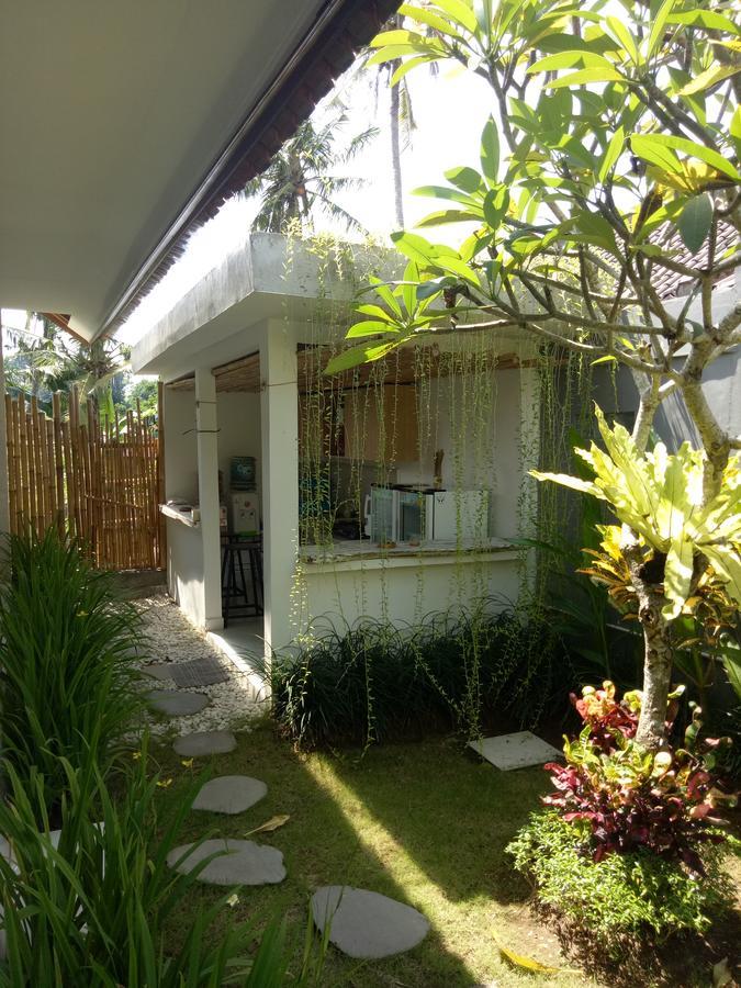 Andy Guesthouse Canggu Extérieur photo
