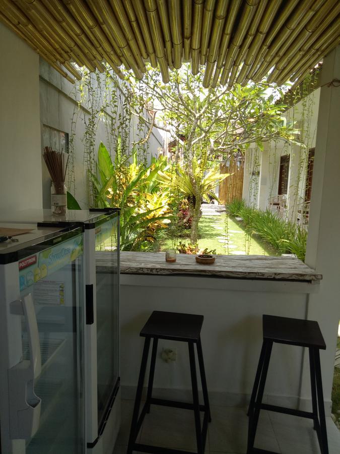 Andy Guesthouse Canggu Extérieur photo