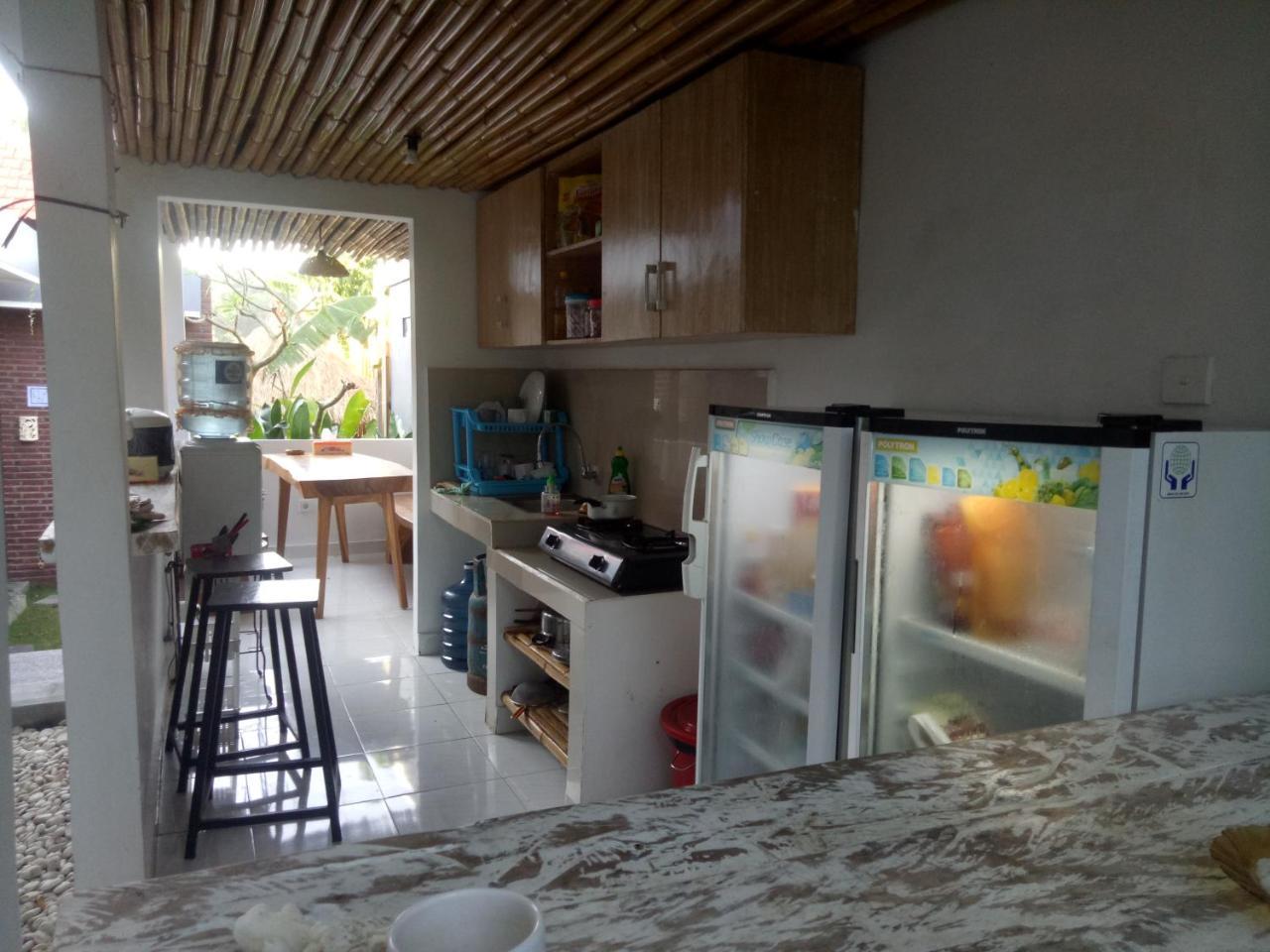 Andy Guesthouse Canggu Extérieur photo